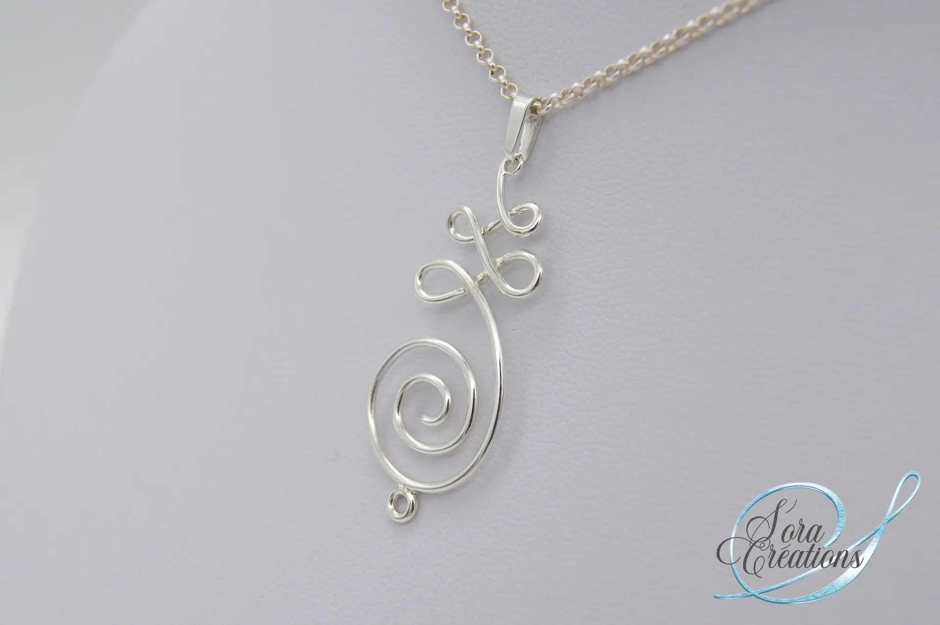 Pendentif argent motif spirale